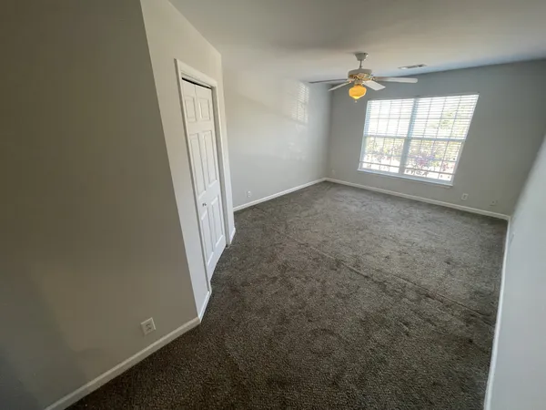 an empty room with windows