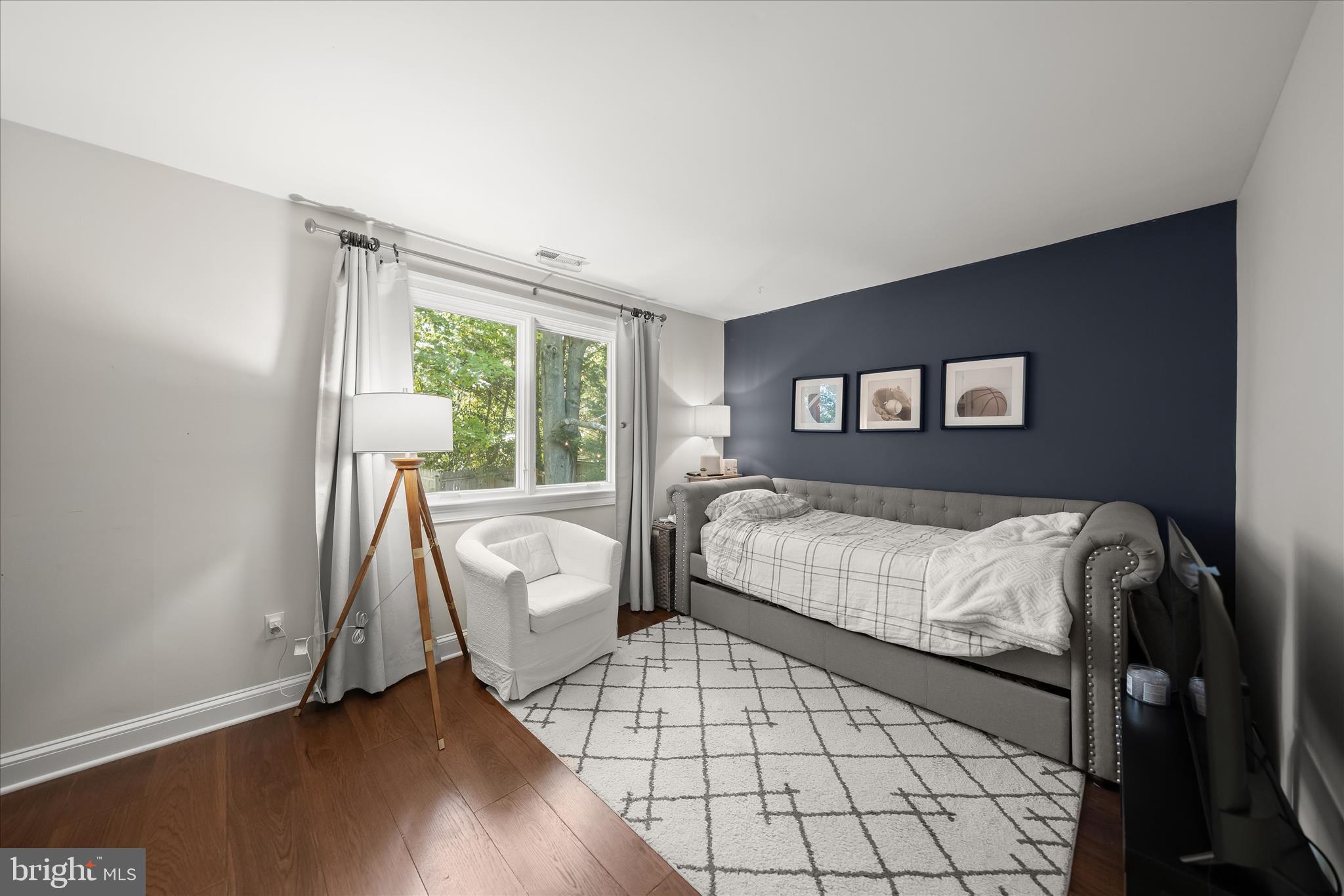 6366 11th Road North Arlington, VA 22205 - Photo 29 of 39 a bedroom with a bed and a large window