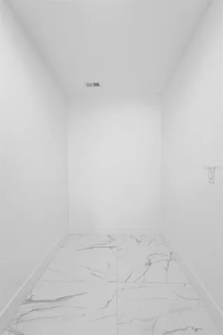 a house with trees in the background