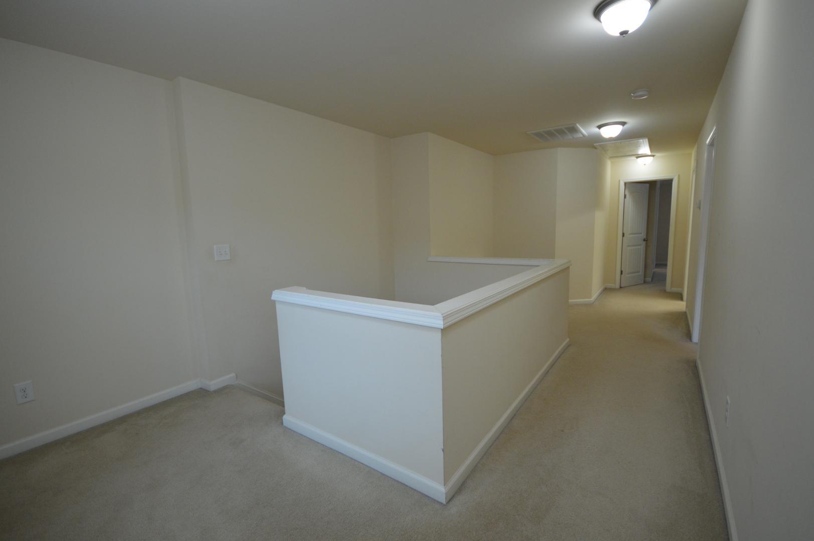 2053 Weston Green Loop Cary, NC 27513 - Photo 17 of 35 a view of an empty room