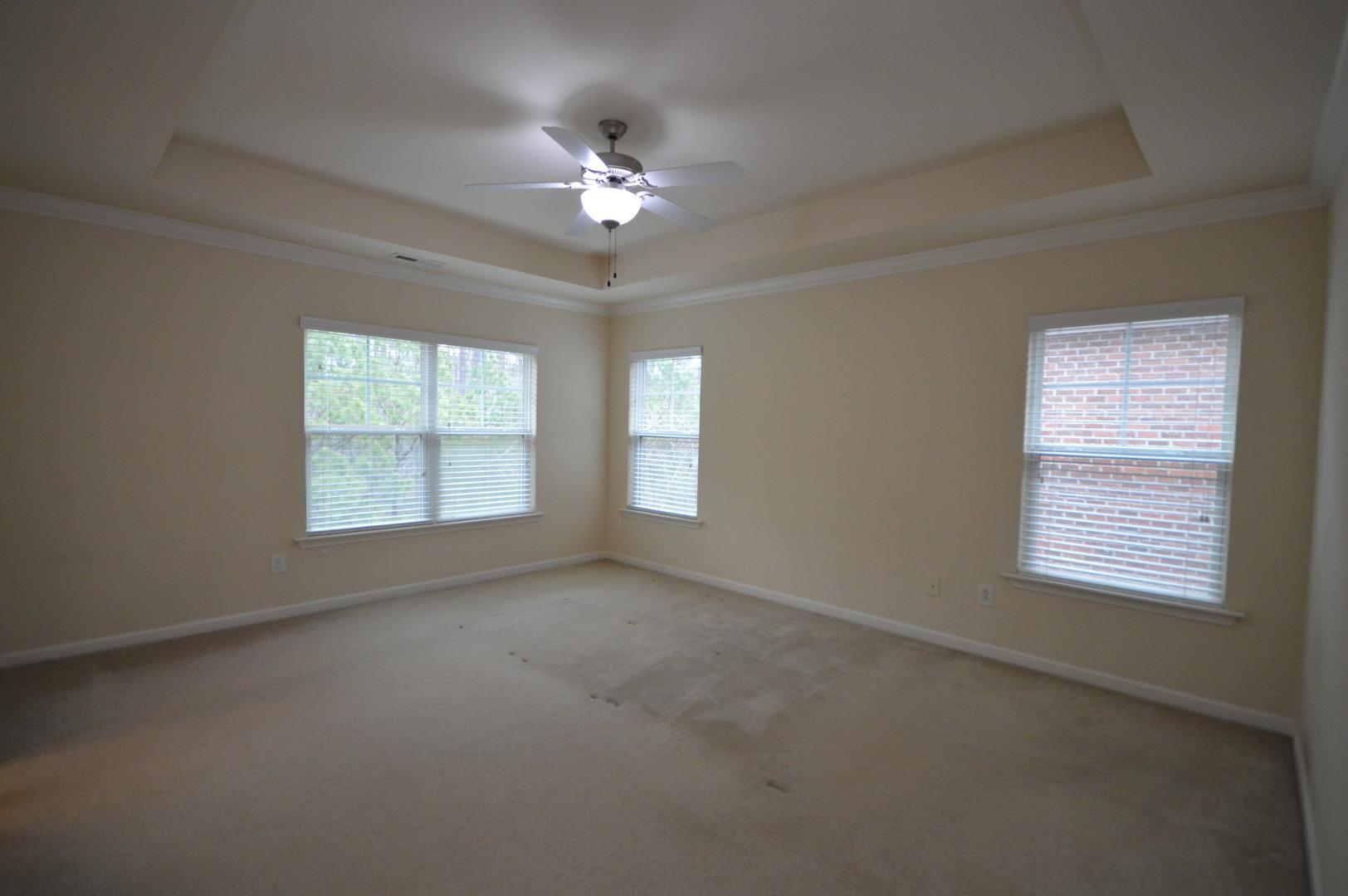 2053 Weston Green Loop Cary, NC 27513 - Photo 18 of 35 a view of an empty room with a window