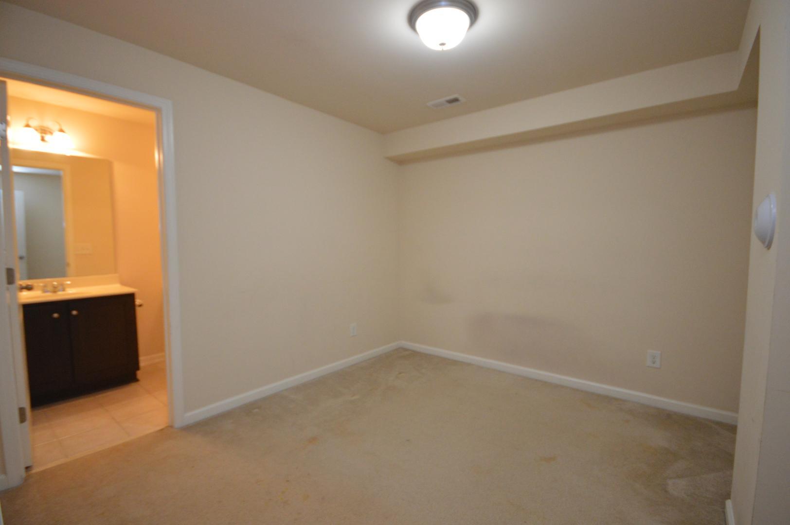 2053 Weston Green Loop Cary, NC 27513 - Photo 28 of 35 a view of an empty room and window