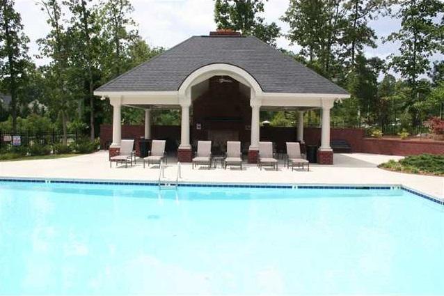 2053 Weston Green Loop Cary, NC 27513 - Photo 34 of 35 a view of swimming pool with outdoor seating and yard