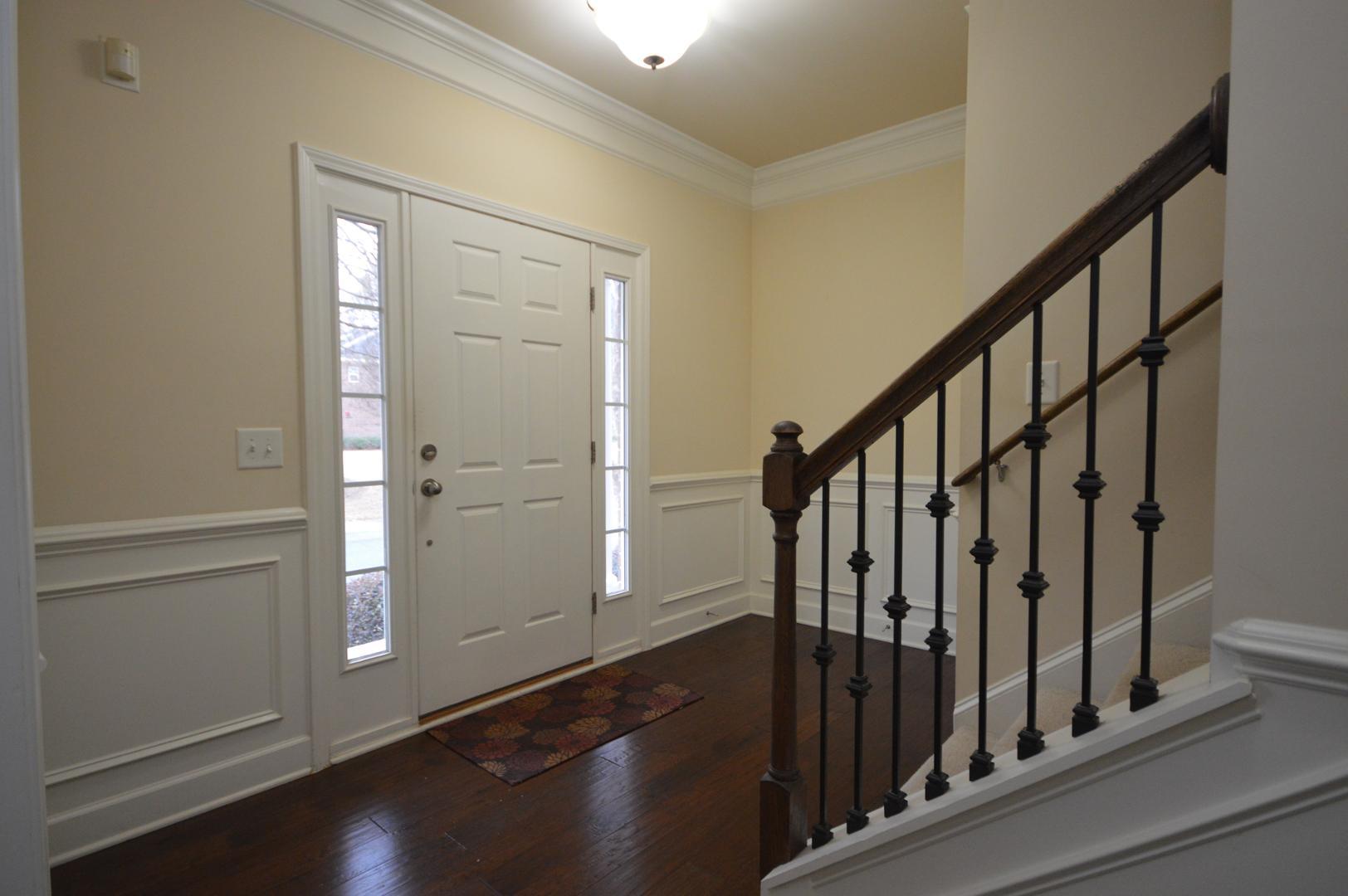 2053 Weston Green Loop Cary, NC 27513 - Photo 5 of 35 a view of an entryway with wooden floor
