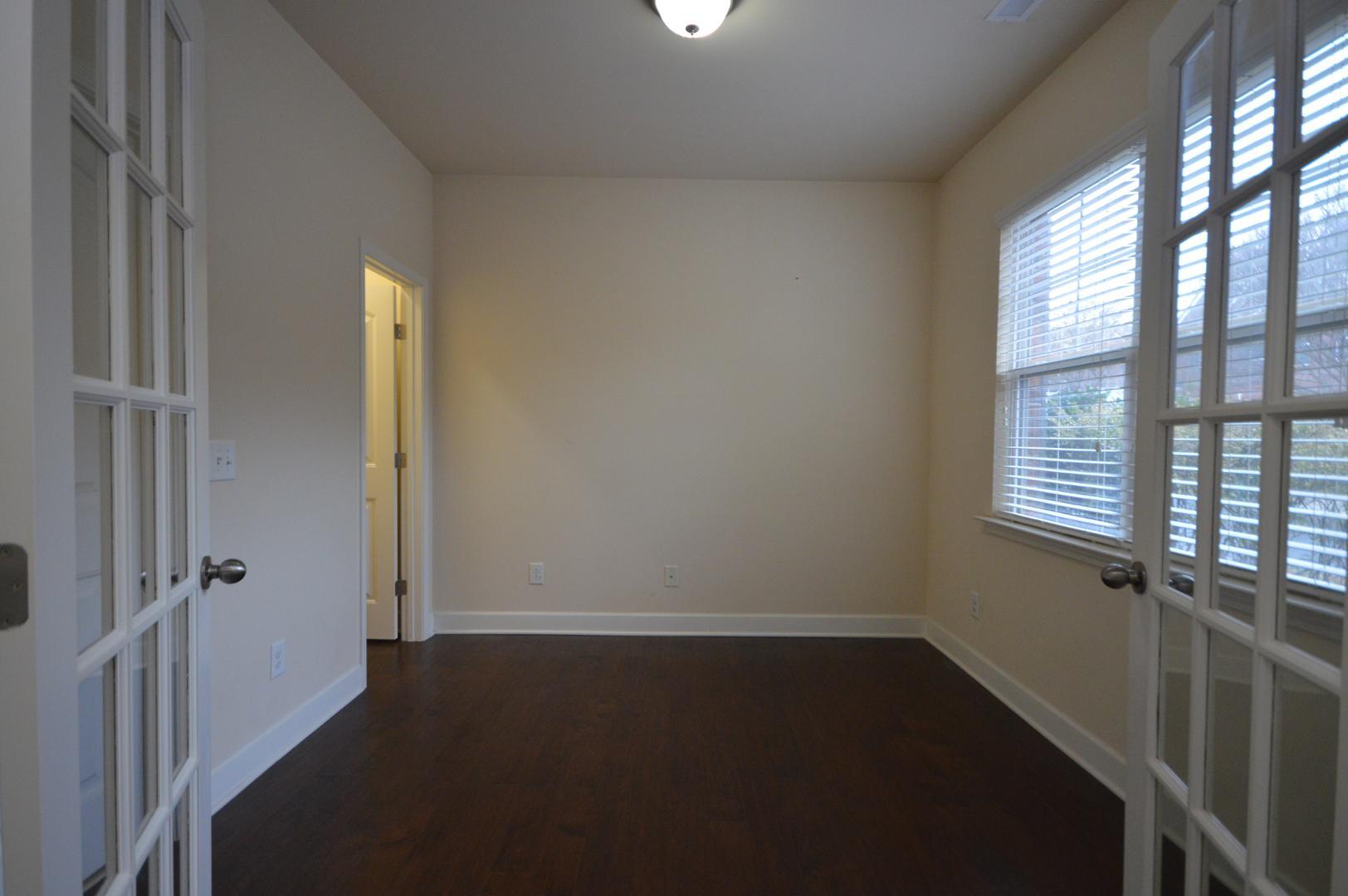 2053 Weston Green Loop Cary, NC 27513 - Photo 6 of 35 an empty room with windows
