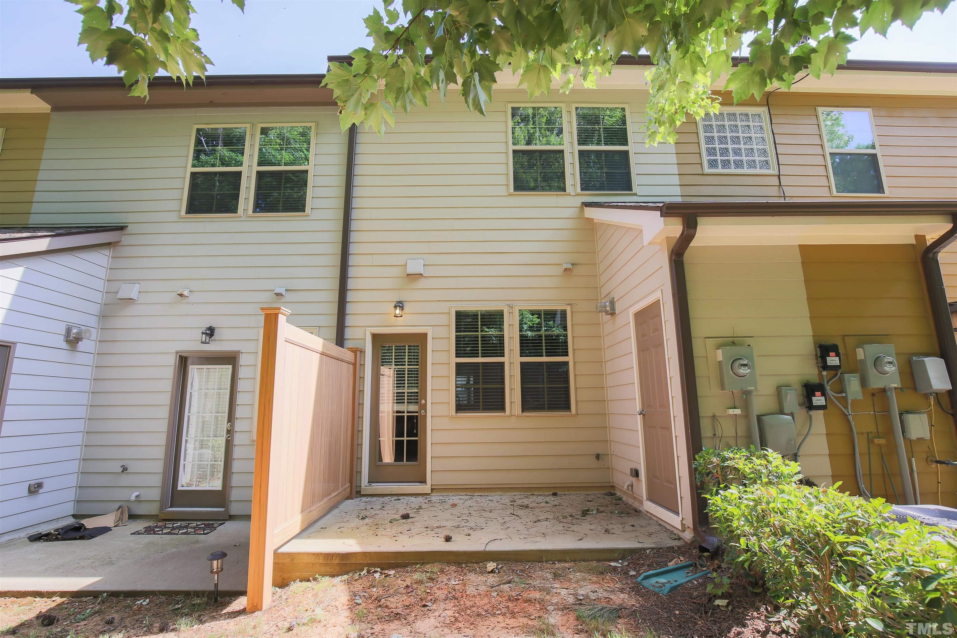 696 Wickham Ridge Road Apex, NC 27539 - Photo 5 of 24 a view of a house with a door and a window