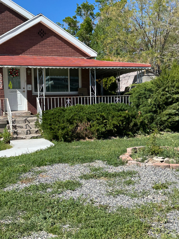 8320 West 3100th Street South Magna, UT 84044 - Photo 5 of 41 View of front of house with covered porch