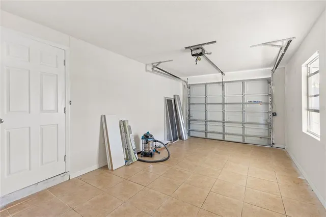 a swimming pool with outdoor seating yard and barbeque oven