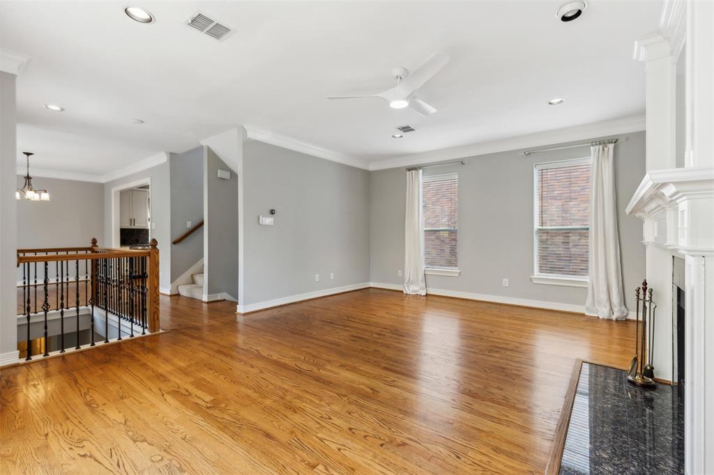 2704 Welborn Street, Unit H Dallas, TX 75219 - Photo 14 of 31 a view of a livingroom with wooden floor