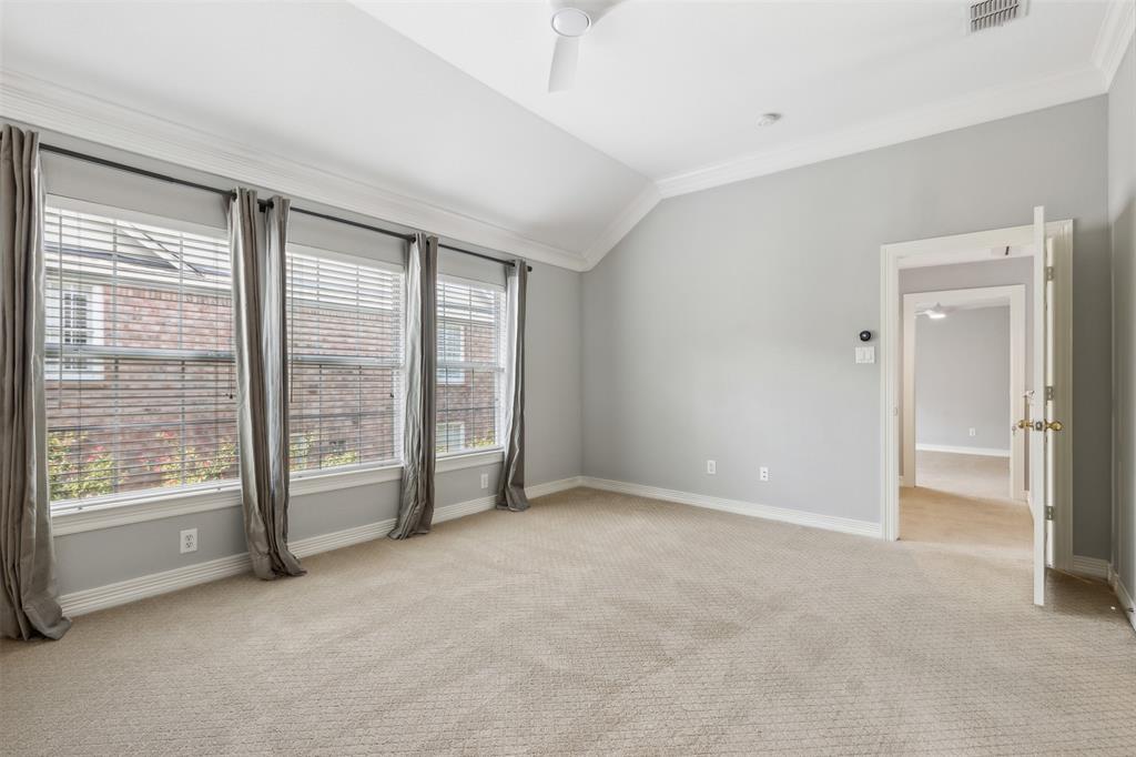 2704 Welborn Street, Unit H Dallas, TX 75219 - Photo 24 of 31 a view of an empty room with glass door