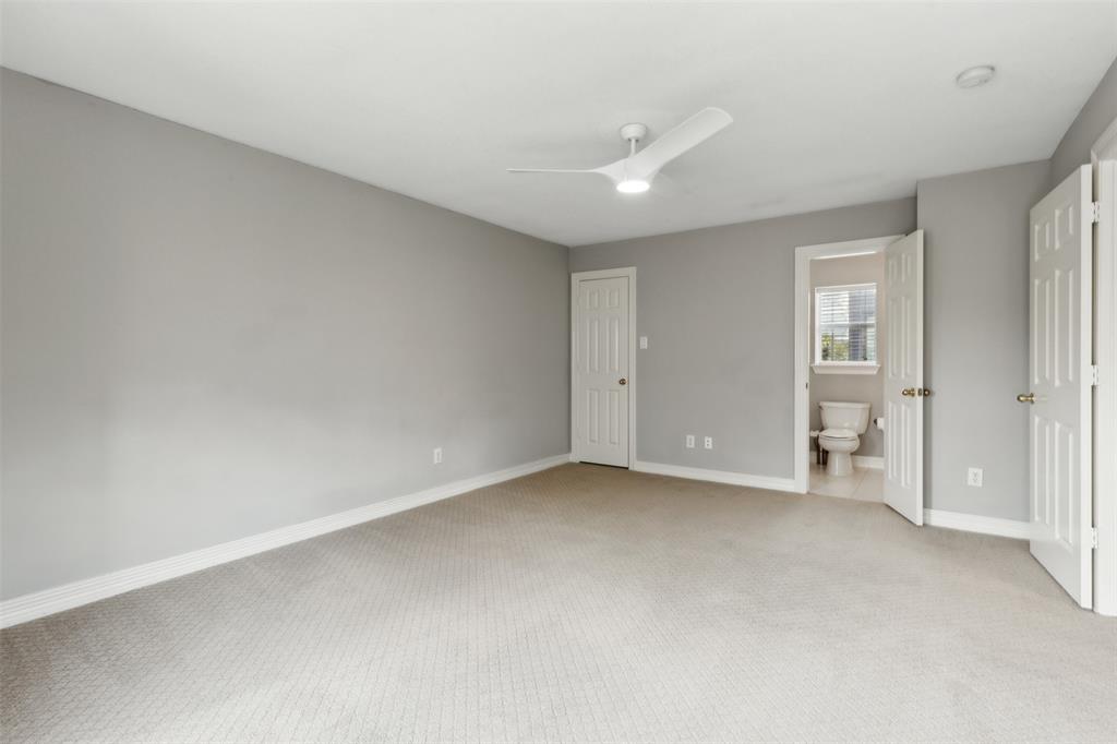 2704 Welborn Street, Unit H Dallas, TX 75219 - Photo 28 of 31 an empty room with a bathroom