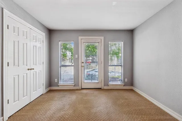 an empty room with windows