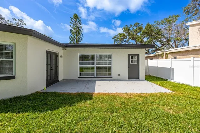 a house view with a garden space