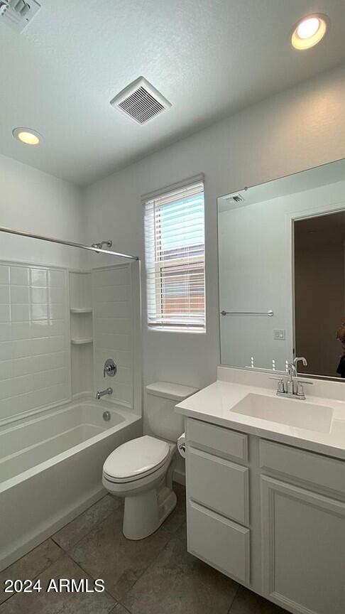 31861 North 125th Lane Peoria, AZ 85383 - Photo 13 of 16 a bathroom with a sink a toilet and a bathtub