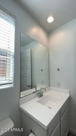 a bathroom with a sink a toilet and a bathtub