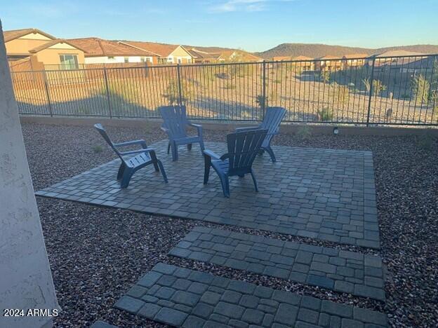 31861 North 125th Lane Peoria, AZ 85383 - Photo 14 of 16 a view of a roof deck with table and chairs