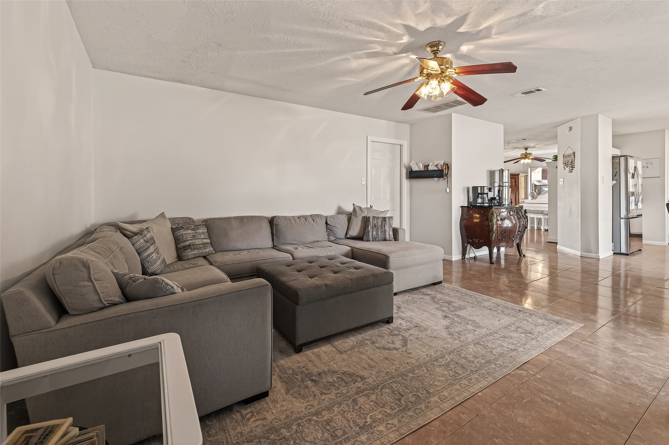 7315 Tara Blue Ridge Drive Richmond, TX 77469 - Photo 12 of 45 a living room with furniture and wooden floor