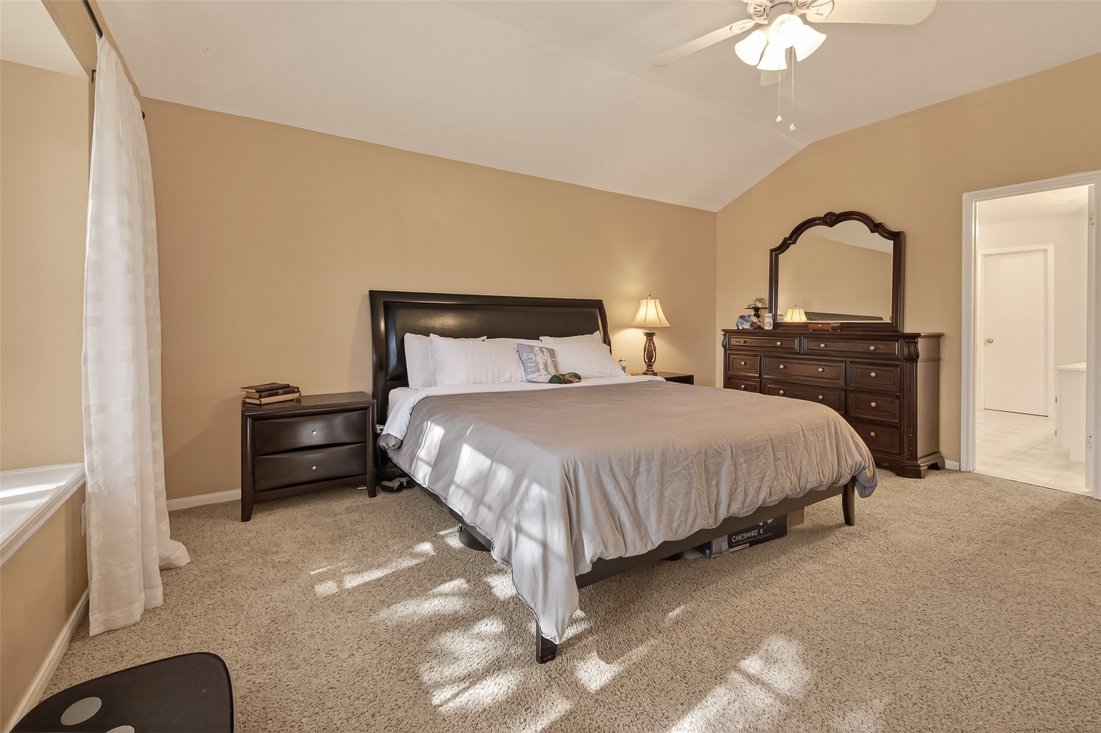 7315 Tara Blue Ridge Drive Richmond, TX 77469 - Photo 26 of 45 a bedroom with a bed and a dresser