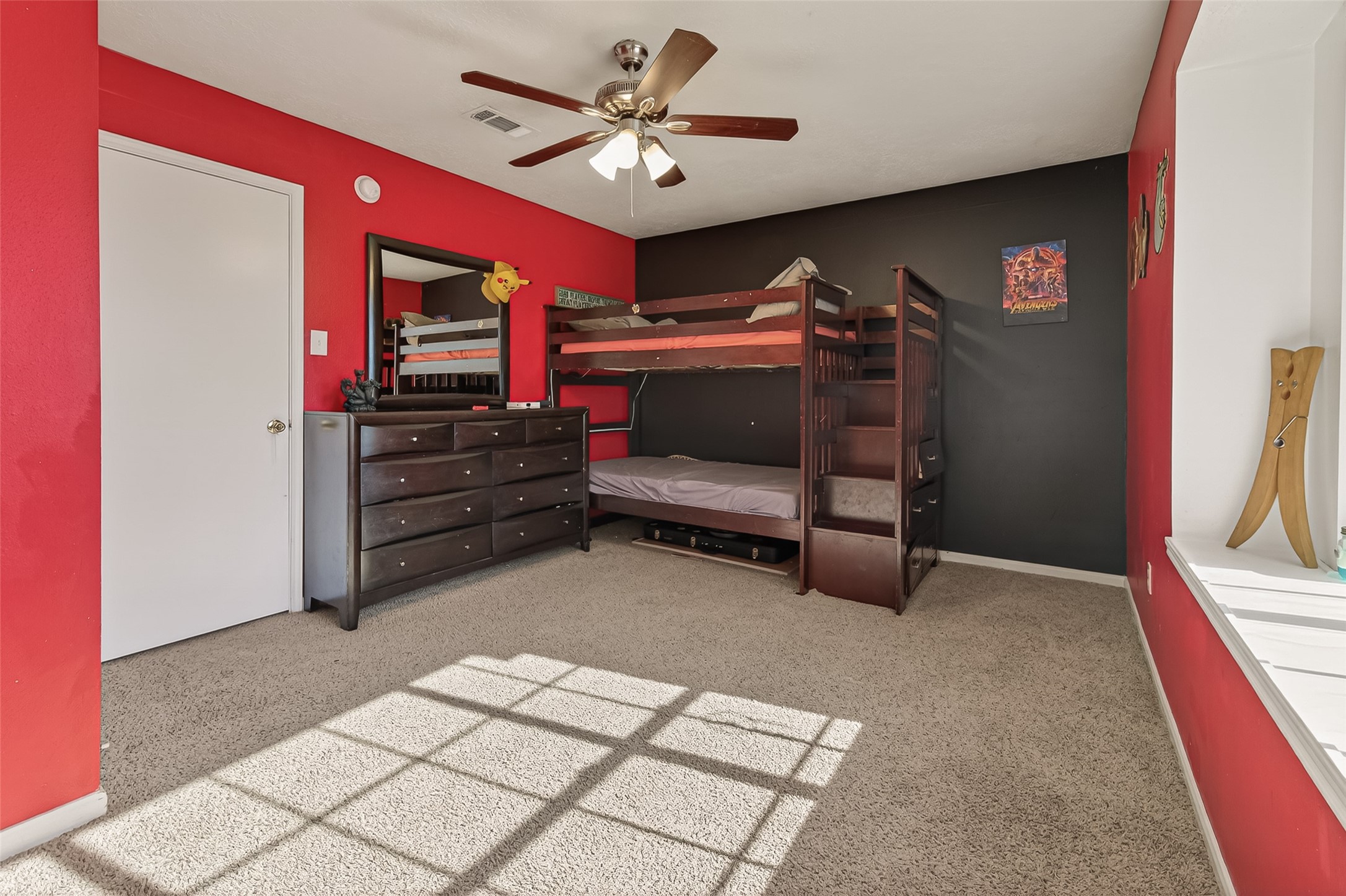 7315 Tara Blue Ridge Drive Richmond, TX 77469 - Photo 33 of 45 a bedroom with furniture and a chandelier