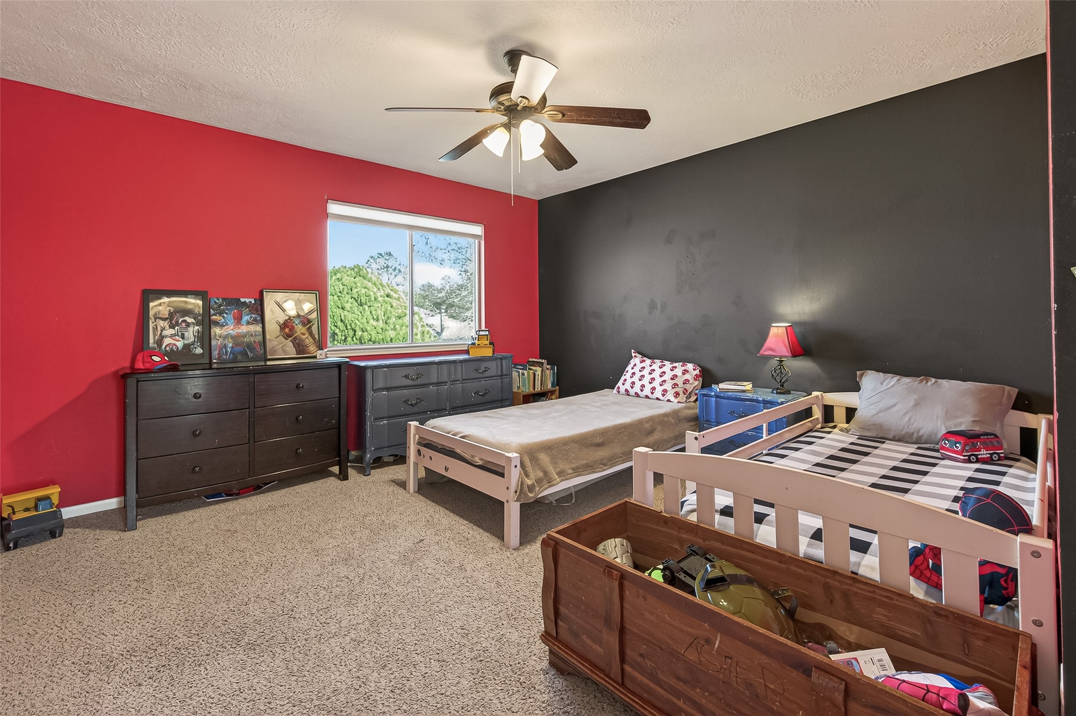 7315 Tara Blue Ridge Drive Richmond, TX 77469 - Photo 35 of 45 a bedroom with furniture and a chandelier