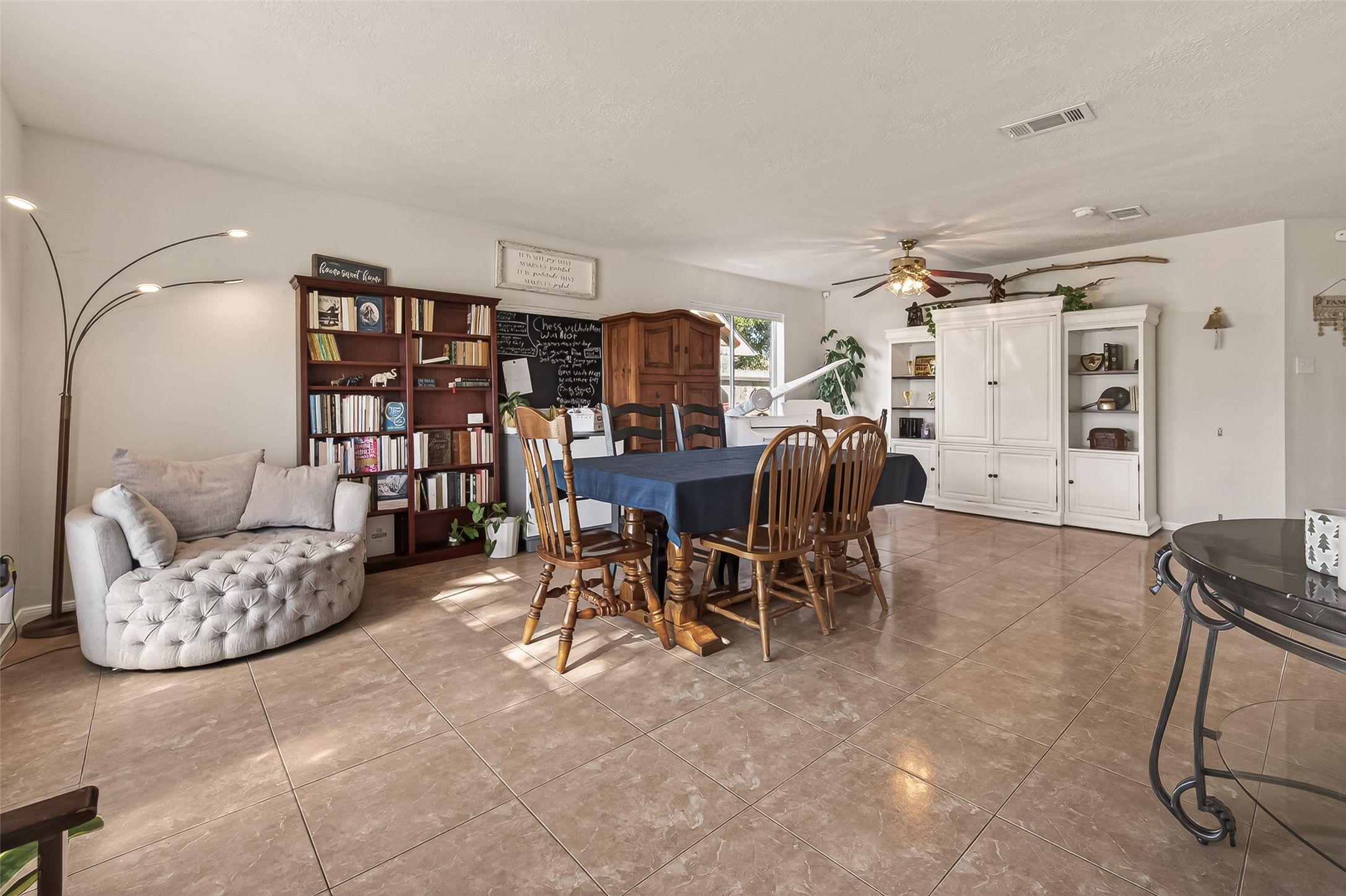 7315 Tara Blue Ridge Drive Richmond, TX 77469 - Photo 5 of 45 a living room with furniture and a large window