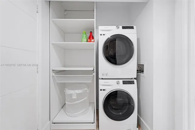 a utility room with dryer and washer