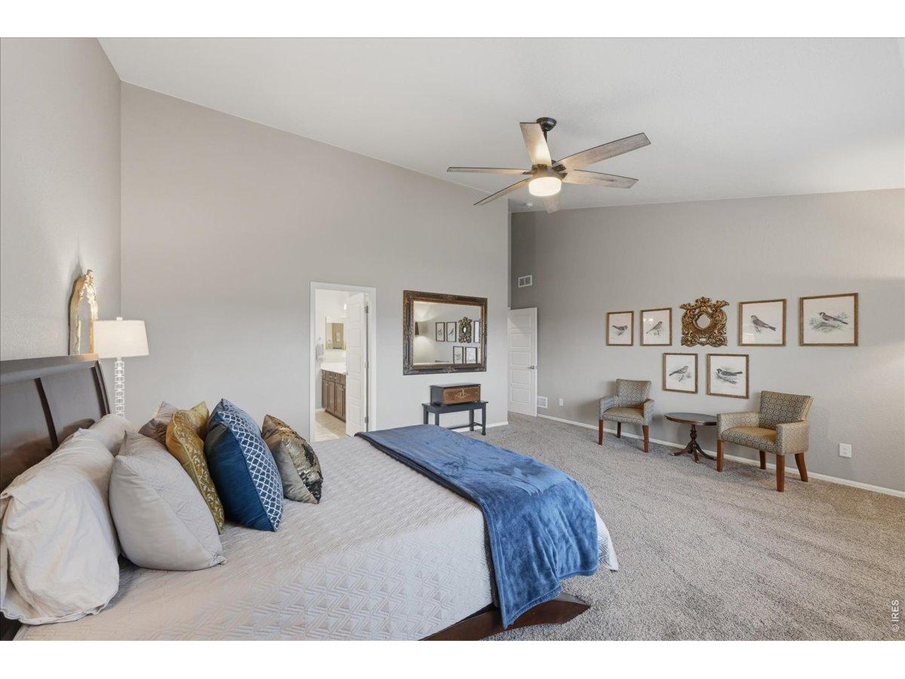 6096 Story Road Timnath, CO 80547 - Photo 19 of 50 a bed room with a bed and furniture