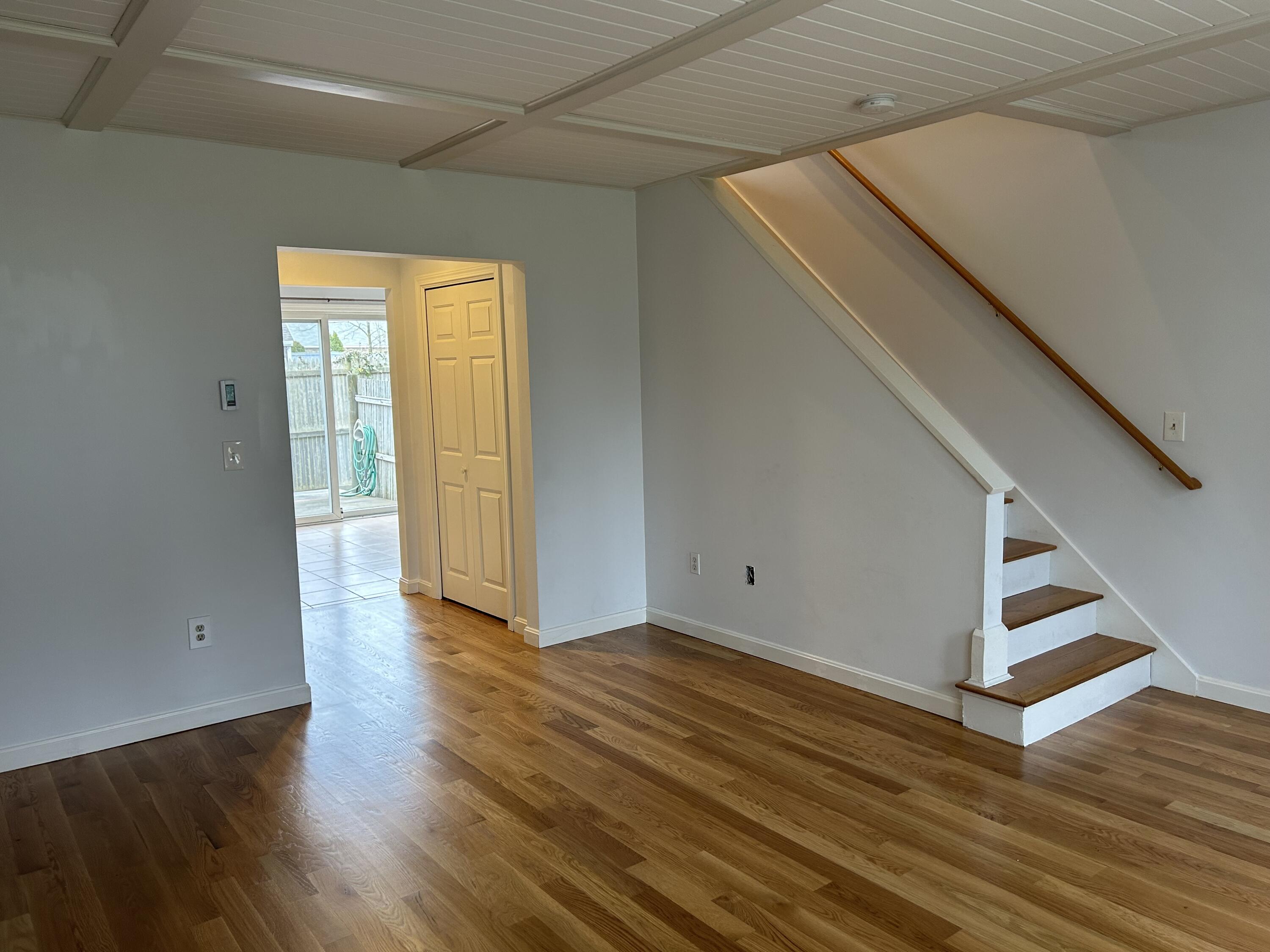 48 Camp Street, Unit 9 Hyannis, MA 02601 - Photo 12 of 42 a view of entryway with wooden floor