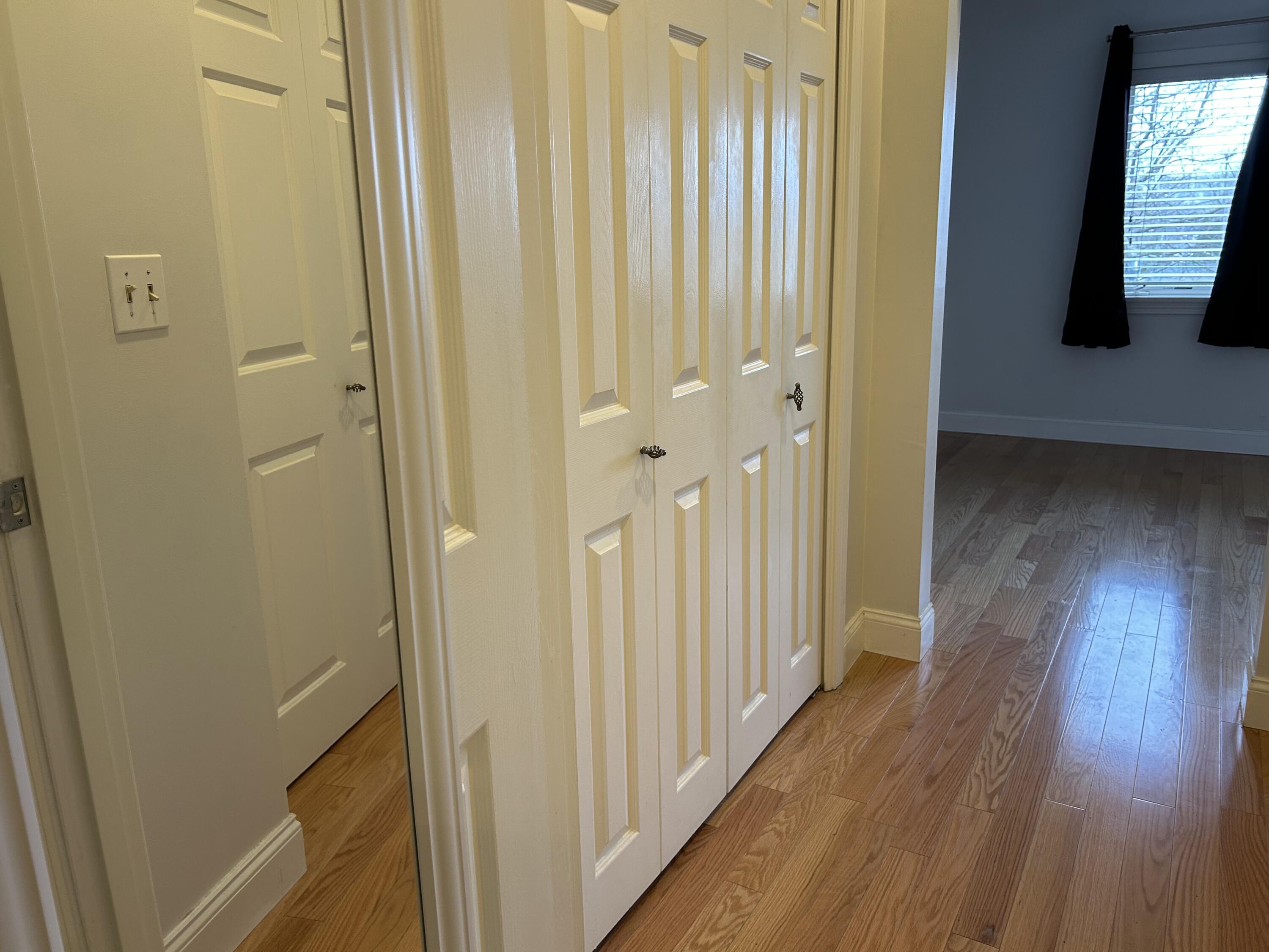 48 Camp Street, Unit 9 Hyannis, MA 02601 - Photo 20 of 42 a view of a hallway with wooden floor