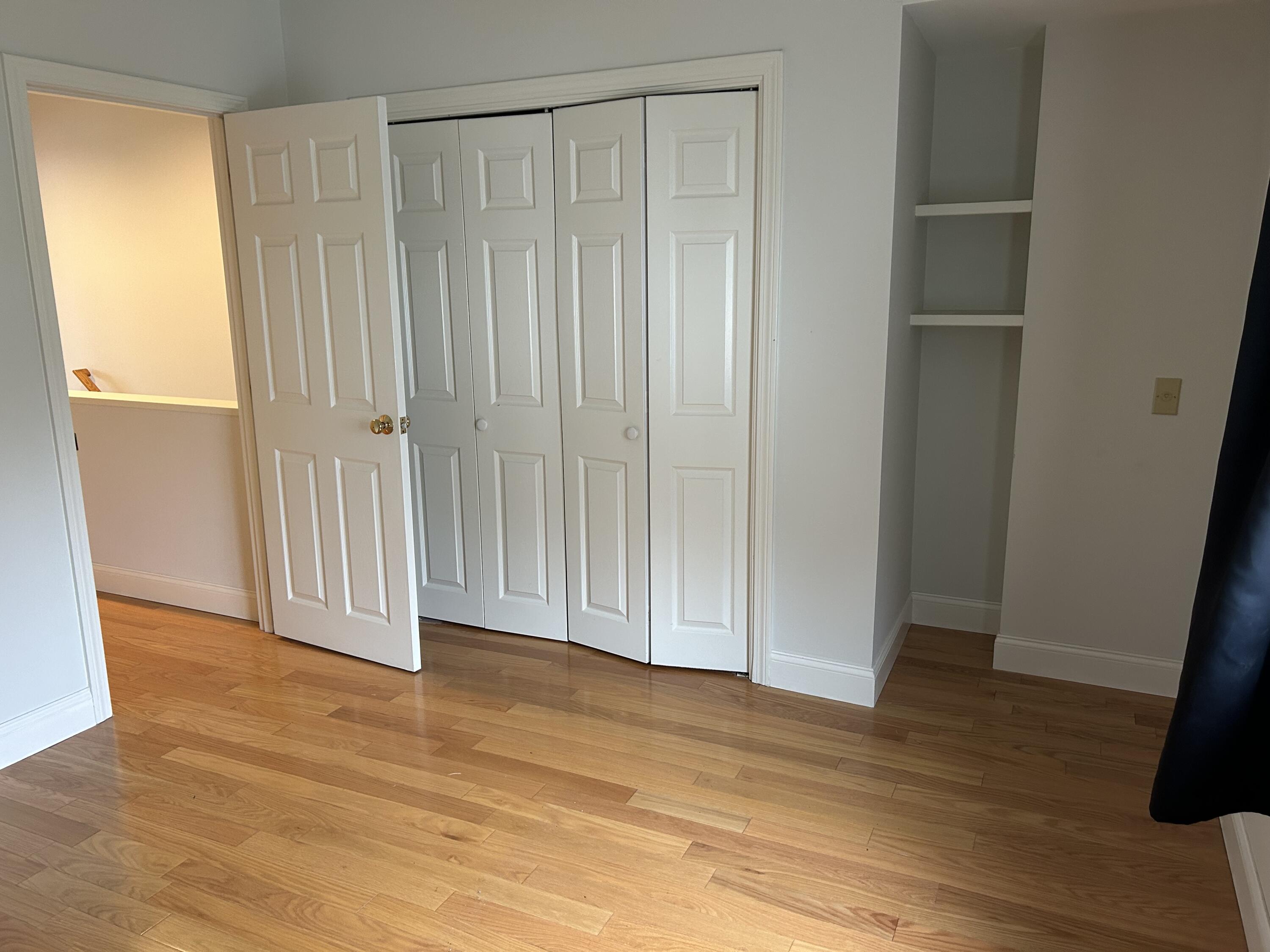 48 Camp Street, Unit 9 Hyannis, MA 02601 - Photo 24 of 42 a view of entryway with wooden floor