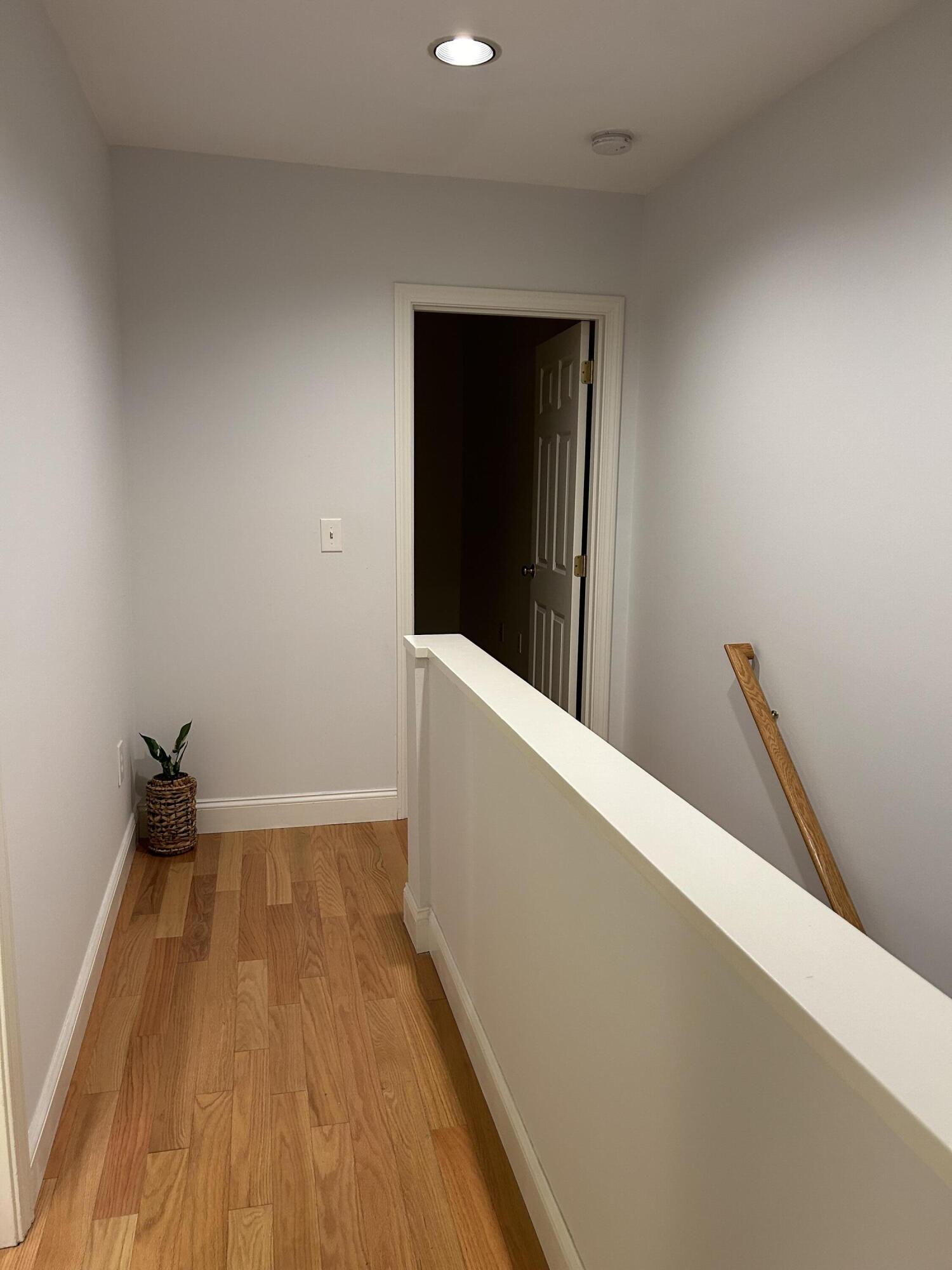 48 Camp Street, Unit 9 Hyannis, MA 02601 - Photo 27 of 42 a view of wooden floor in a room