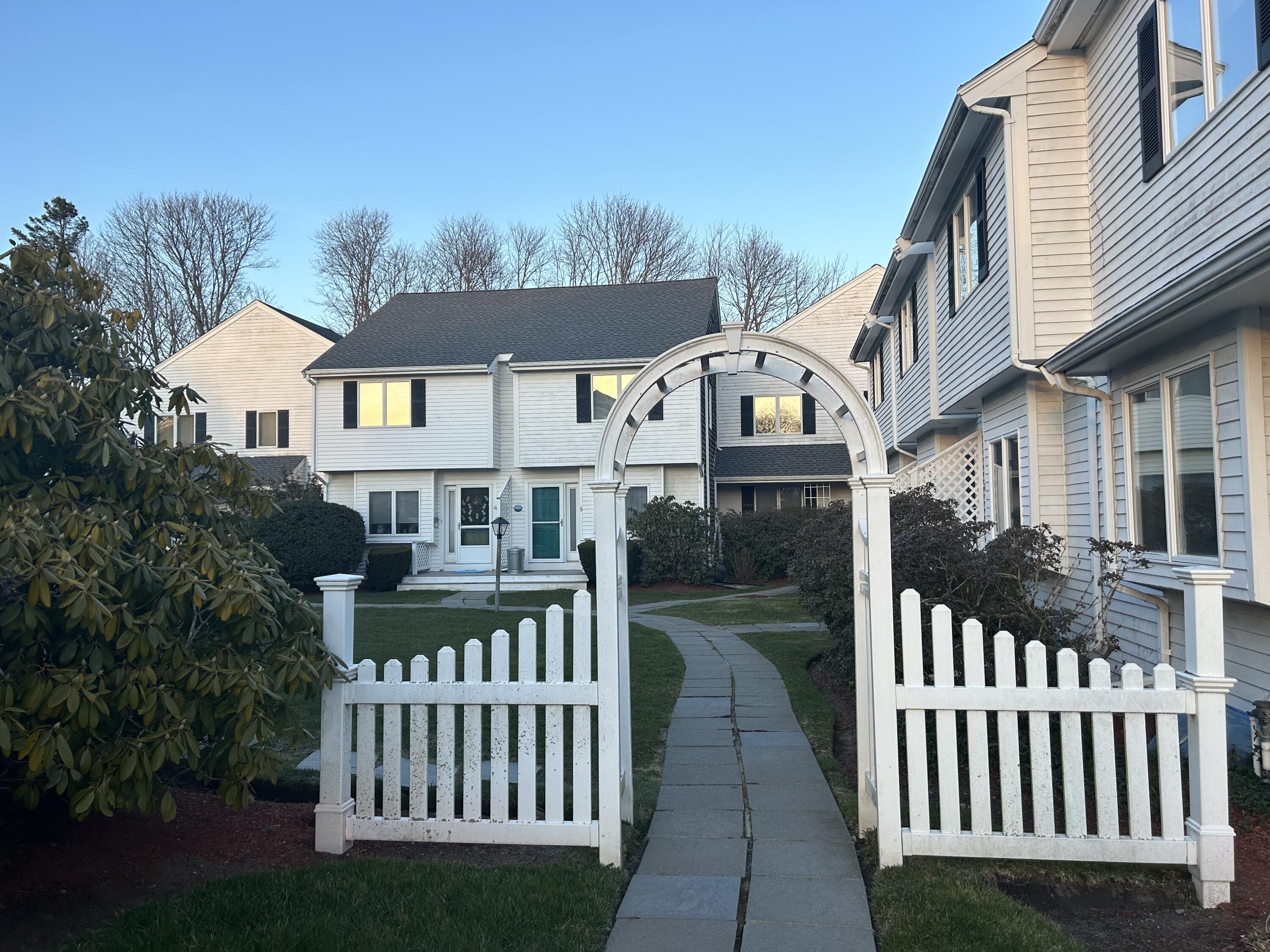 48 Camp Street, Unit 9 Hyannis, MA 02601 - Photo 38 of 42 a view of a house with a small yard