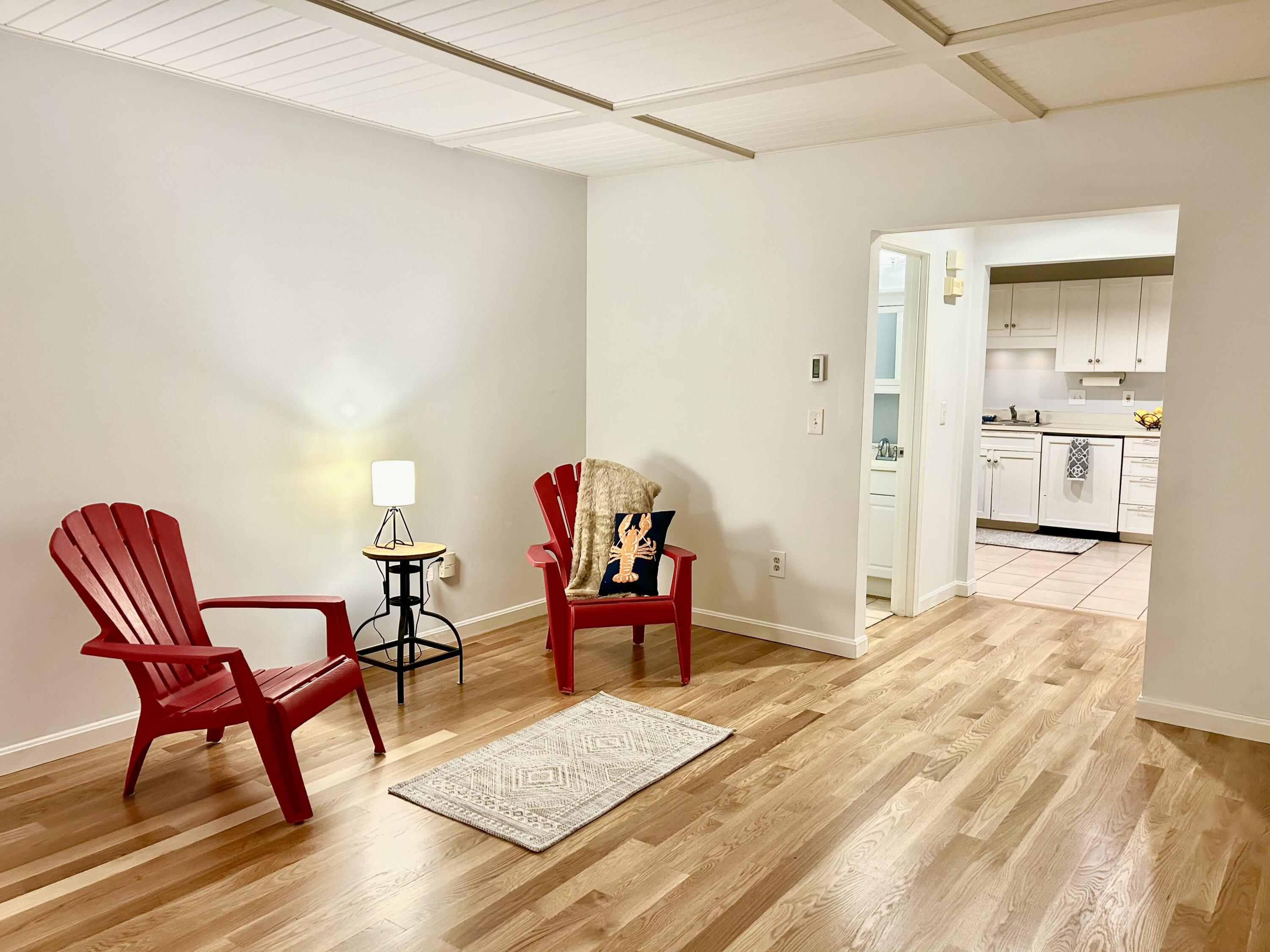 48 Camp Street, Unit 9 Hyannis, MA 02601 - Photo 5 of 42 a view of a livingroom with furniture and lounge chair