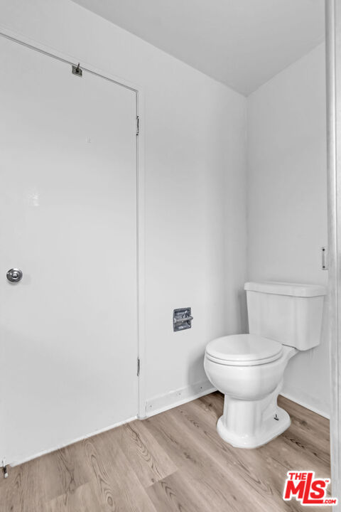 732 Lorraine Boulevard, Unit 5 Los Angeles, CA 90005 - Photo 14 of 25 a bathroom with a toilet and a shower