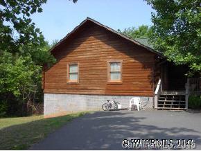306 Dark Corner Road Rutherfordton, NC 28139 - Photo 5 of 9 a front view of a house with garden