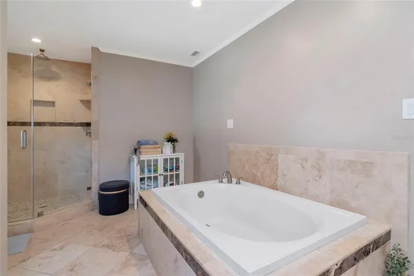 a bathroom with a granite countertop sink mirror and double