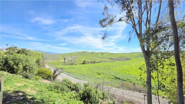 a view of a yard with an outdoor space