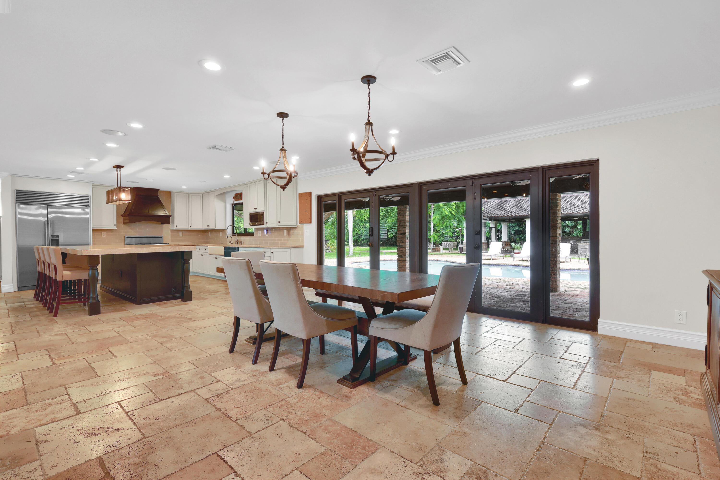 14701 Southwest 63rd Street Southwest Ranches, FL 33330 - Photo 14 of 47 a view of a dining room with furniture window and outside view