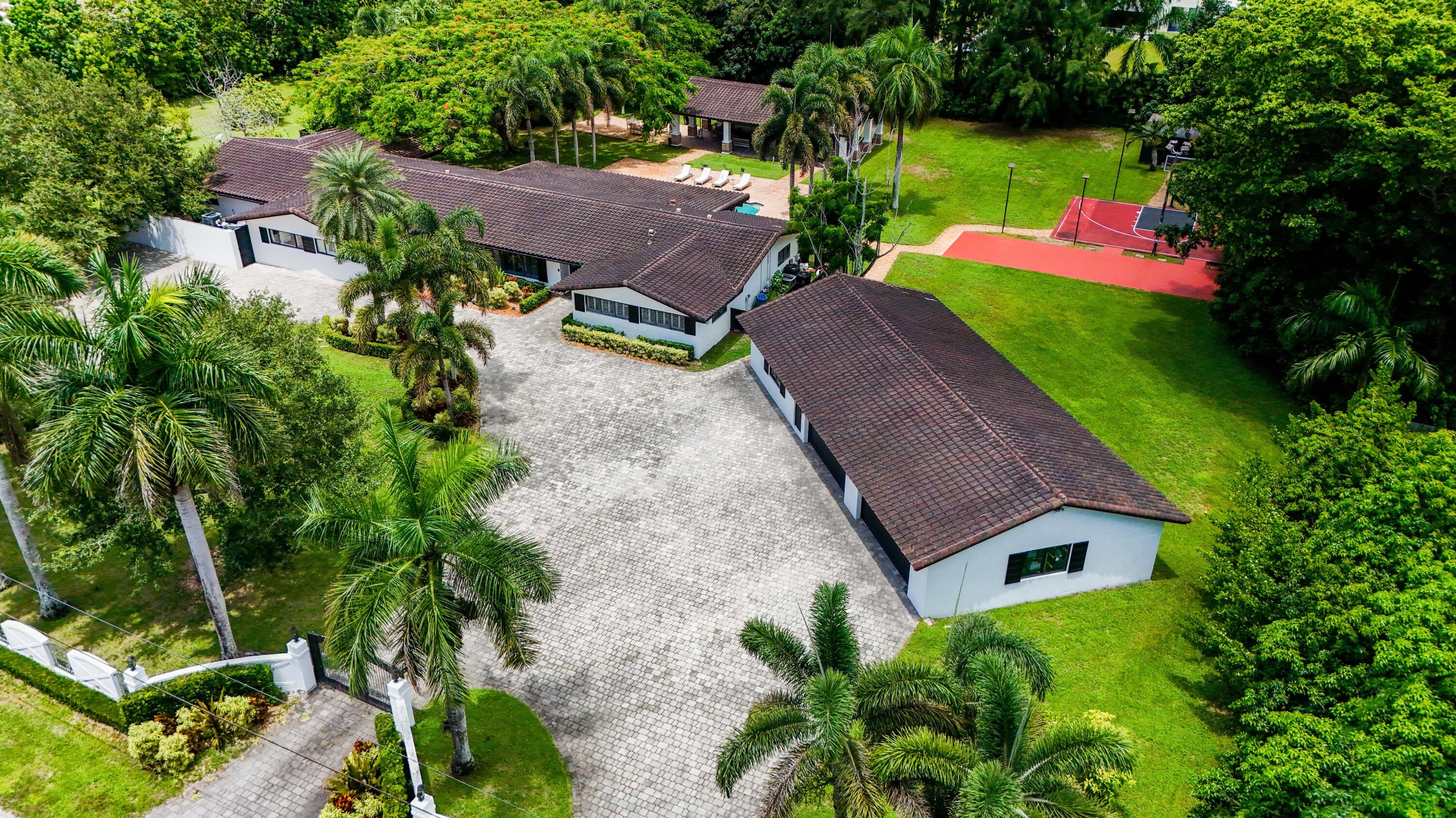 14701 Southwest 63rd Street Southwest Ranches, FL 33330 - Photo 4 of 47 an aerial view of a house with yard