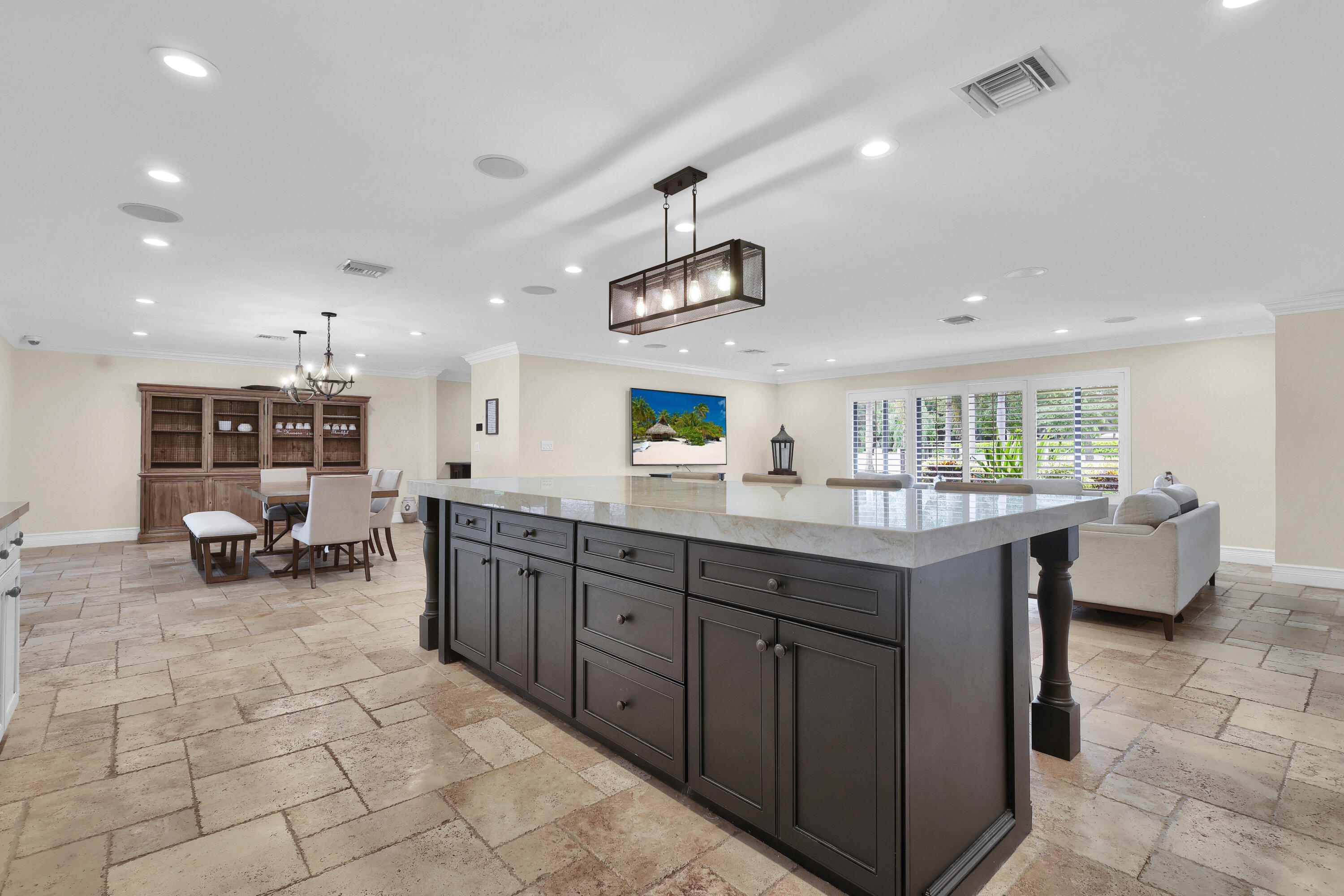 14701 Southwest 63rd Street Southwest Ranches, FL 33330 - Photo 8 of 47 a kitchen with kitchen island granite countertop lots of counter top space