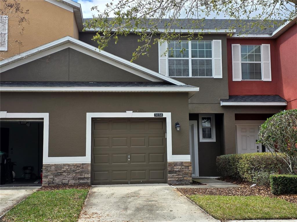 3158 Rodrick Circle Orlando, FL 32824 - Photo 1 of 17 a house view with a outdoor space