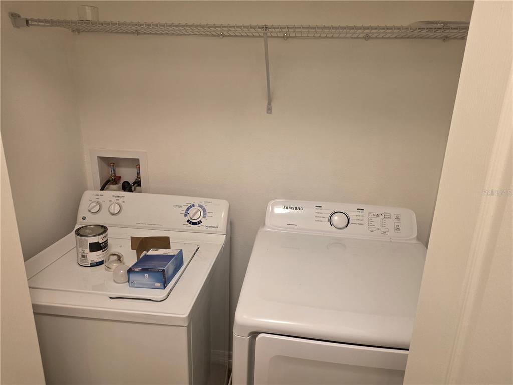 3158 Rodrick Circle Orlando, FL 32824 - Photo 15 of 17 a utility room with dryer and washer