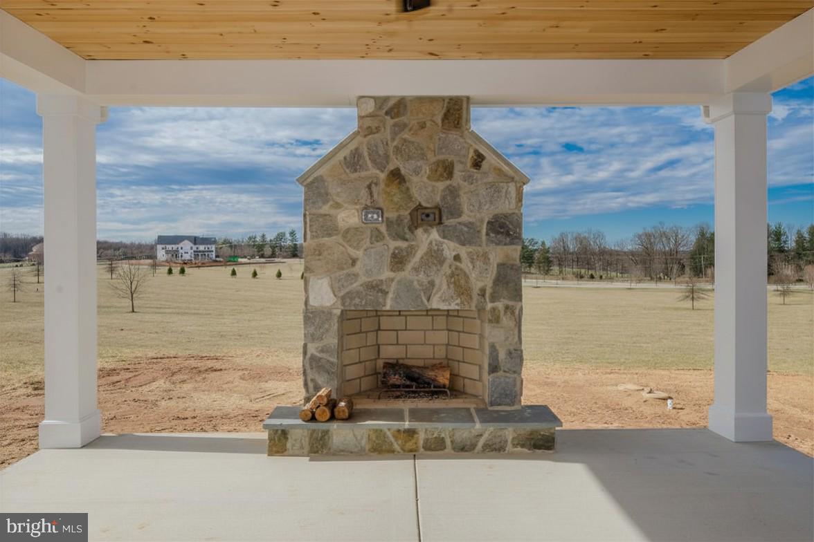 1930 Pleasantville Road Forest Hill, MD 21050 - Photo 8 of 11 Cozy stone fireplace with scenic views.