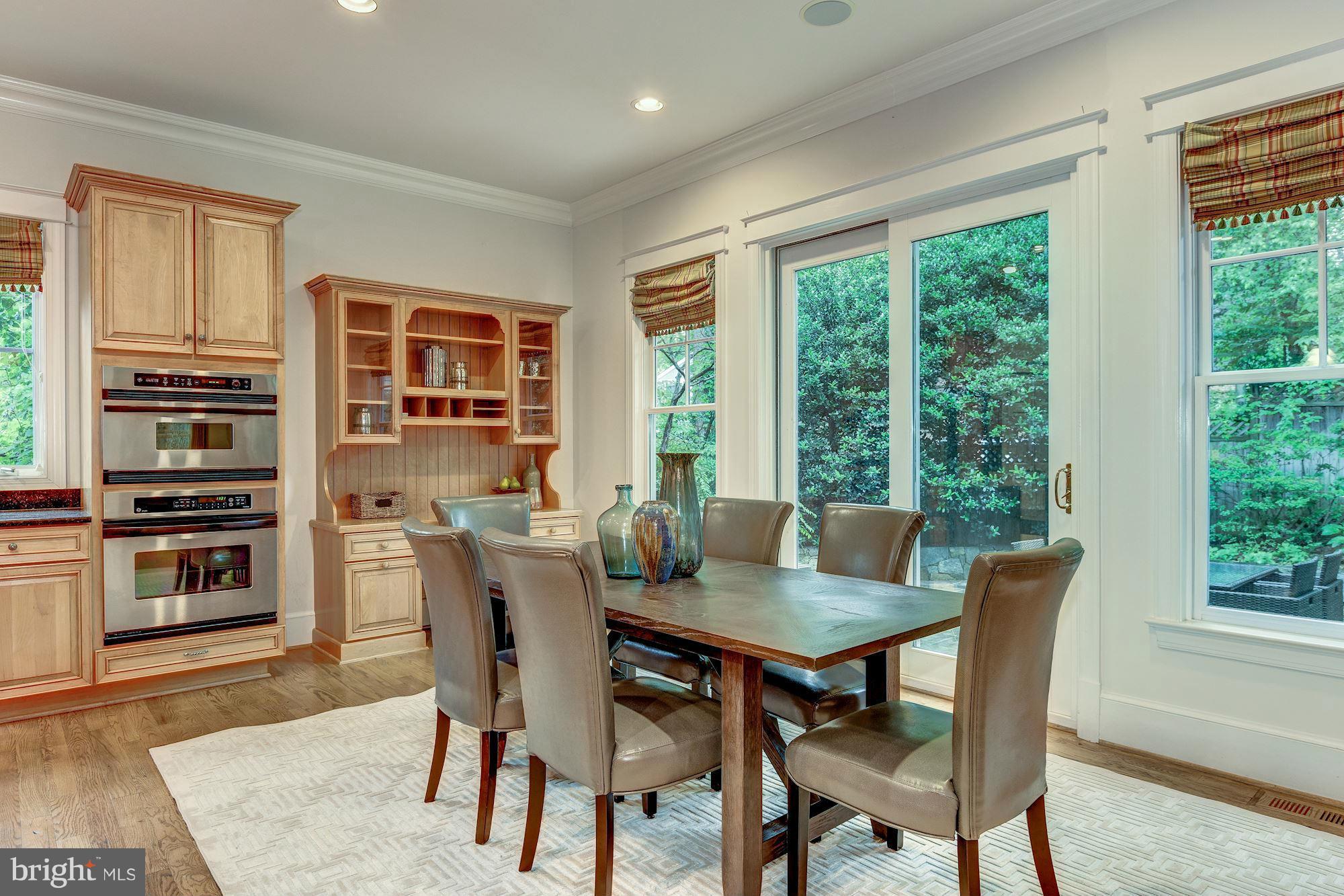 8007 Overhill Road Bethesda, MD 20814 - Photo 7 of 22 Breakfast Area with doors to Stone Patio