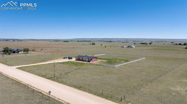 5929 North Log Road Calhan, CO 80808 - Photo 40 of 41 Drone / aerial view featuring a rural view