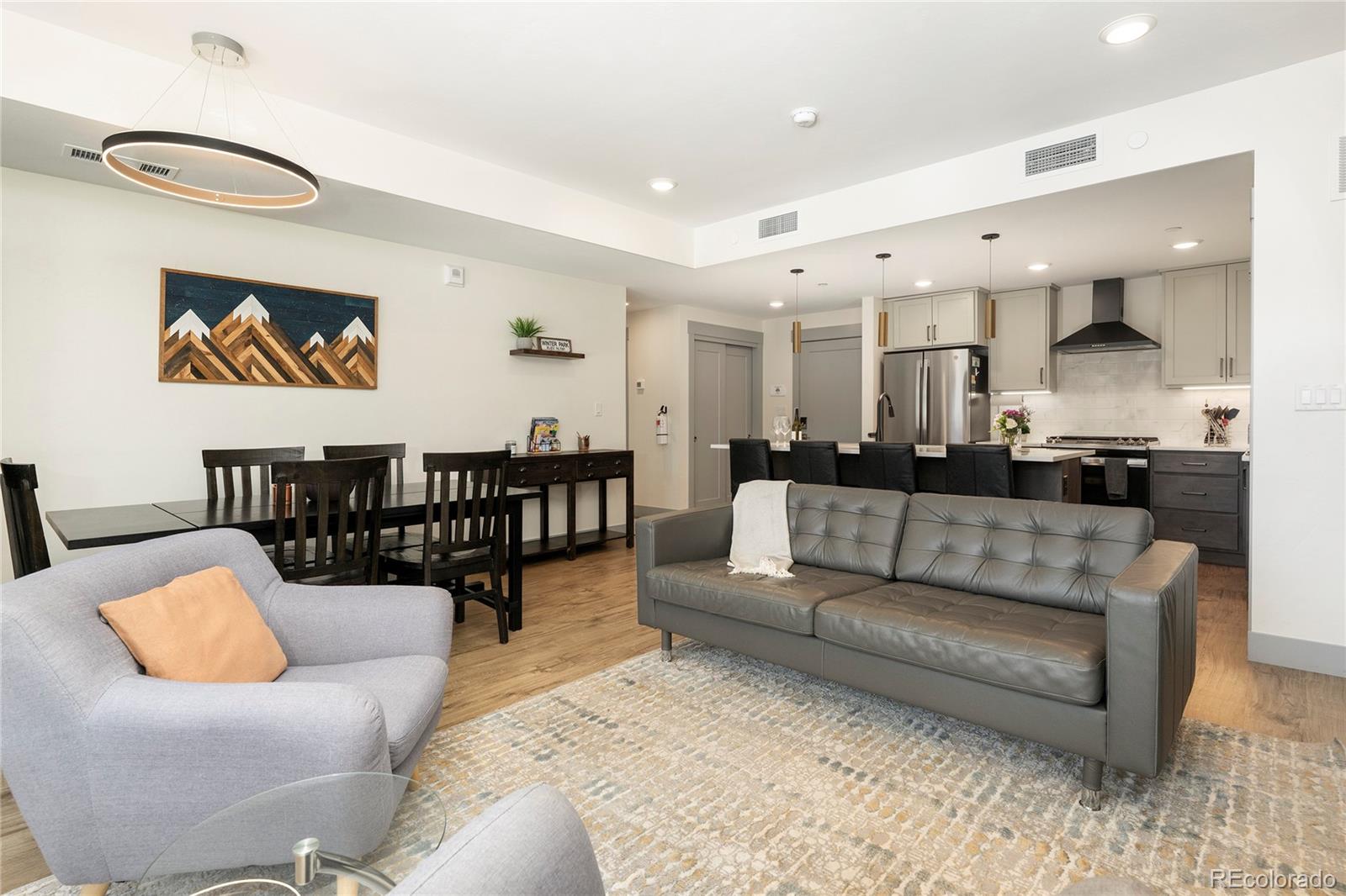 144 Ski Idlewild Road, Unit 2203 Winter Park, CO 80482 - Photo 17 of 45 a living room with furniture and kitchen view