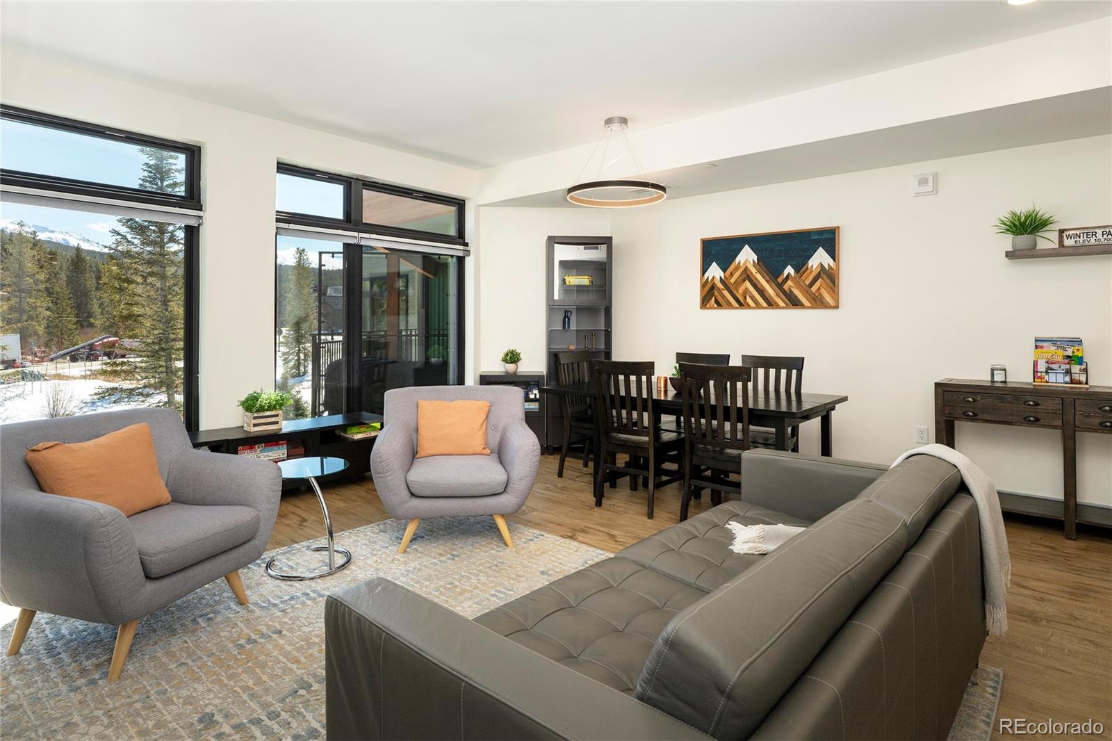 144 Ski Idlewild Road, Unit 2203 Winter Park, CO 80482 - Photo 19 of 45 a living room with furniture and a large window