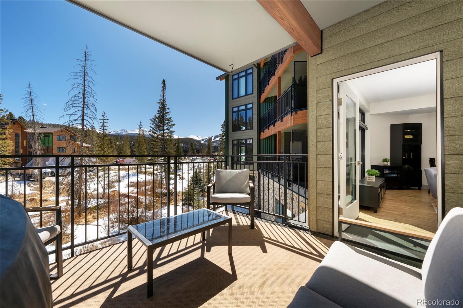 144 Ski Idlewild Road, Unit 2203 Winter Park, CO 80482 - Photo 26 of 45 a view of a balcony with wooden floor