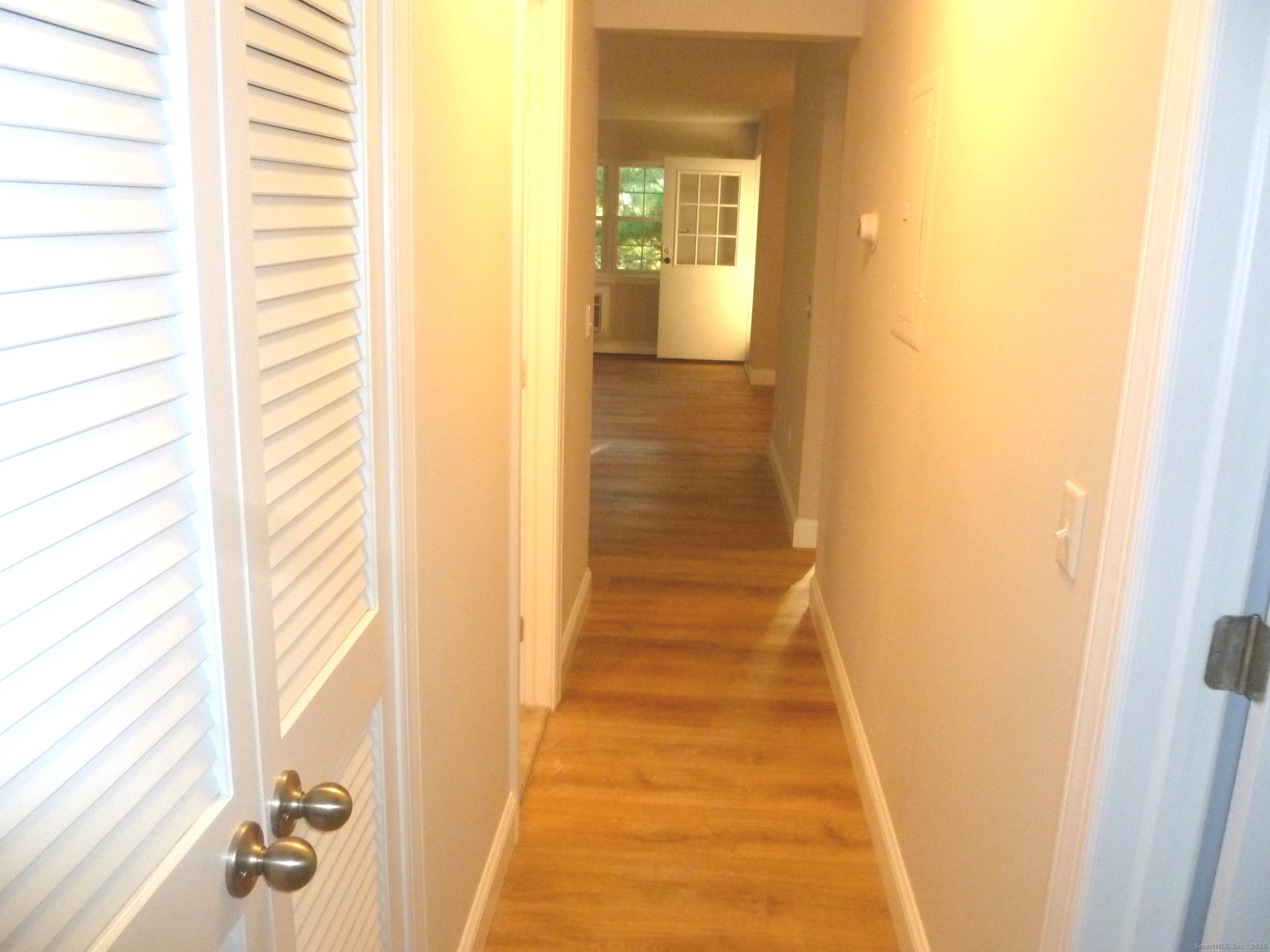 2955 Madison Avenue, Unit 46 Bridgeport, CT 06606 - Photo 15 of 29 a view of a bathroom from a hallway