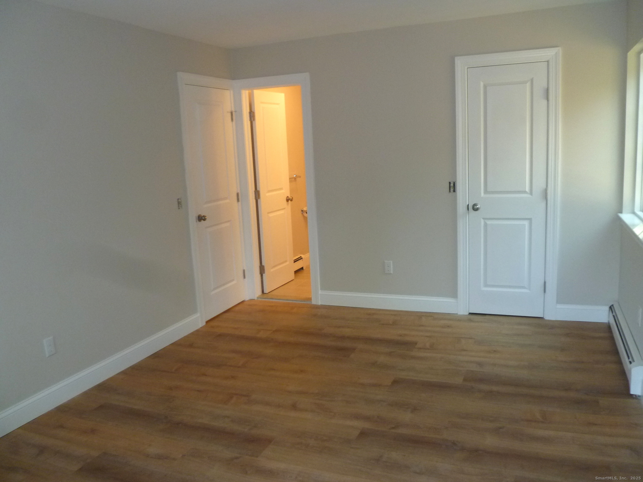 2955 Madison Avenue, Unit 46 Bridgeport, CT 06606 - Photo 24 of 29 a view of an empty room and window